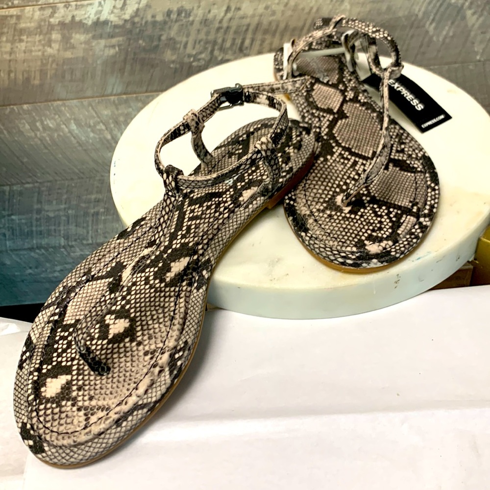 Size 7 snake print sandals.